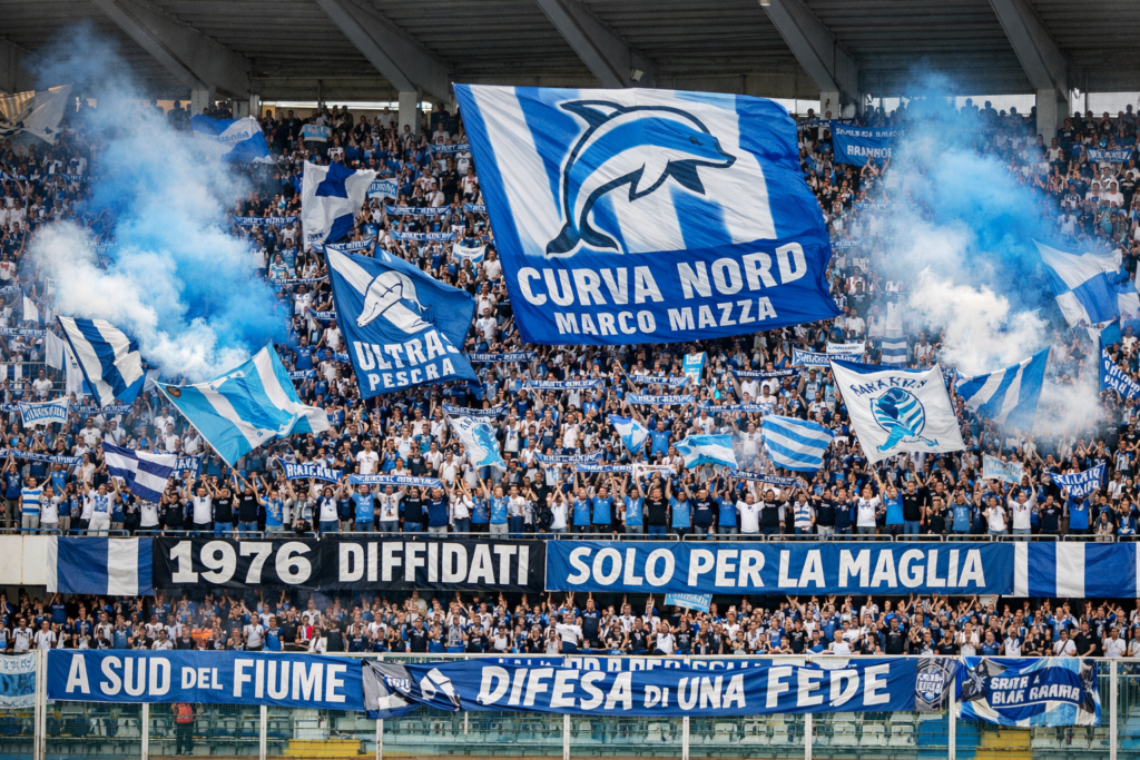 Tifosi del Pescara in Curva Nord allo stadio Adriatico Giovanni Cornacchia con bandiere biancazzurre